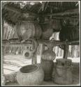 Gourds, pots and baskets inside storage hut