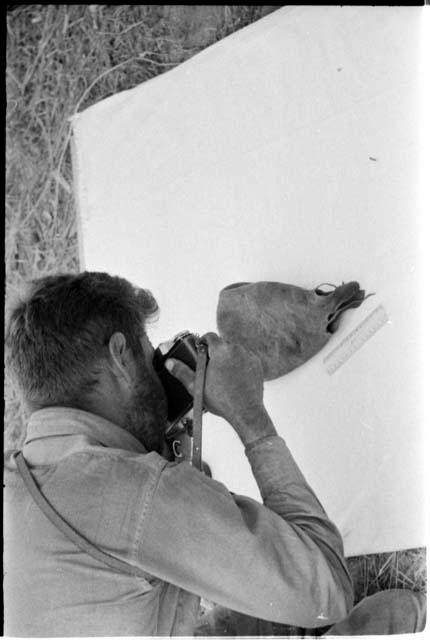 Daniel Blitz photographing a bag