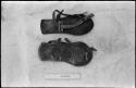 /Twikwe's sandals, with a ruler for measurement