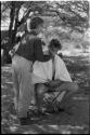 Lorna Marshall giving Casper Kruger a haircut