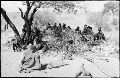 Members of the visiting band from Okwa sitting with Oukwane's group, in Oukwane's werft