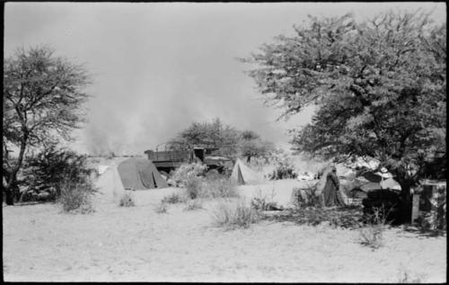 Expedition camp, with veld fire in background