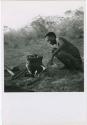 Bo, brother of /Naoka (first wife of "Gao Medicine"), visiting Gautscha, and cooking meat in an Ovambo pot