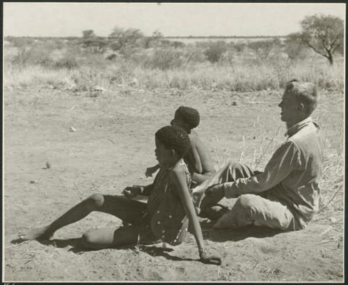 Two boys sitting with John Marshall (print is a cropped image)