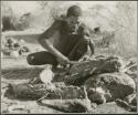 "Gao Medicine" cutting up meat (print is a cropped image)