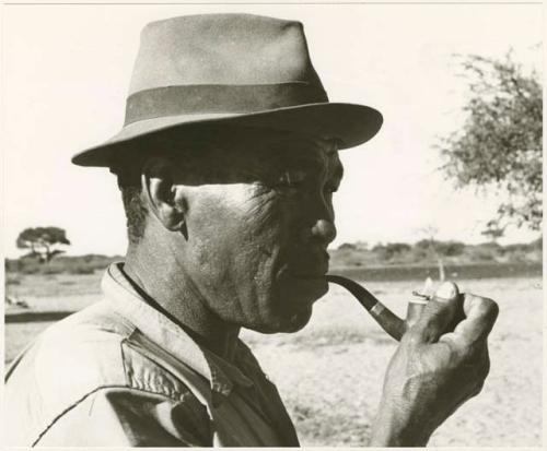 Wilhelm Camm smoking a pipe (print is a cropped image)