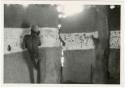 Boy drawing on the wall in Okwa