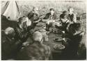 Knoble and his group sitting at a table eating