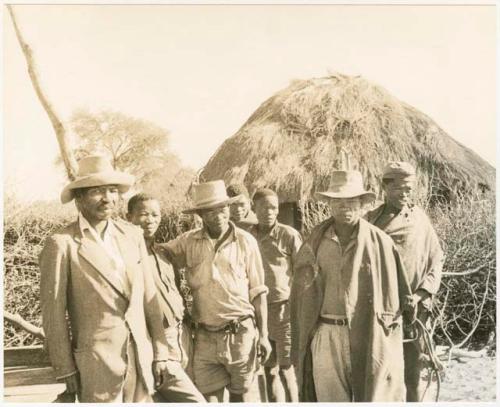 Boys, his brother, and local workers (print is a cropped image)