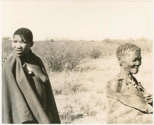 Elderly woman and a young woman (print is a cropped image)