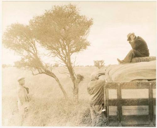 Laurence Marshall speaking to Wilhelm Camm, who is on the truck (print is a cropped image)