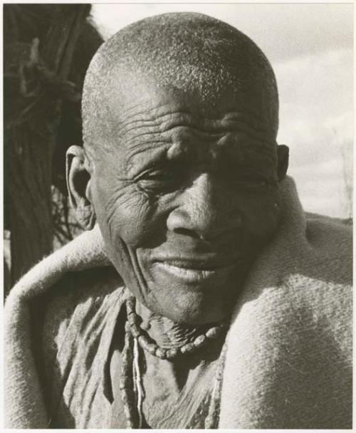 Elderly woman (print is a cropped image)