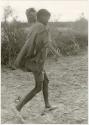 Boy with a musical instrument (print is a cropped image)