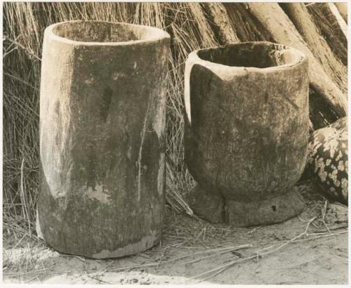 Two types of mortars, one tall and one short (print is a cropped image)