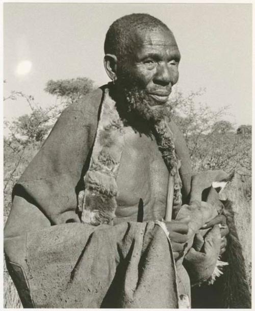 Elderly blind man in a kaross (print is a cropped image)