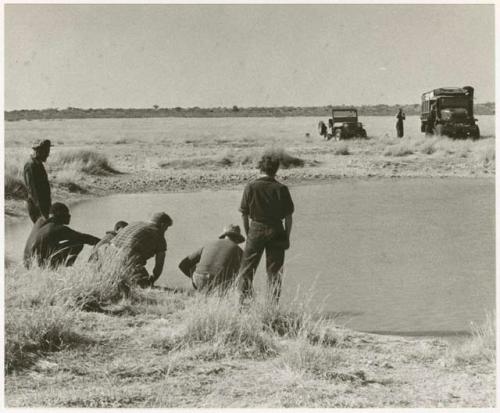 Expedition members and truck around !Kusi Pan (print is a cropped image)