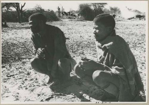 Two men seated