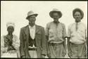 Unidentified woman, David (Venter's son), Petrus (Venter's son), and an unidentified man