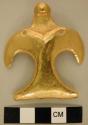 Very thin gold ornament- abstract bird shape with hole on either shoulder.  Holl