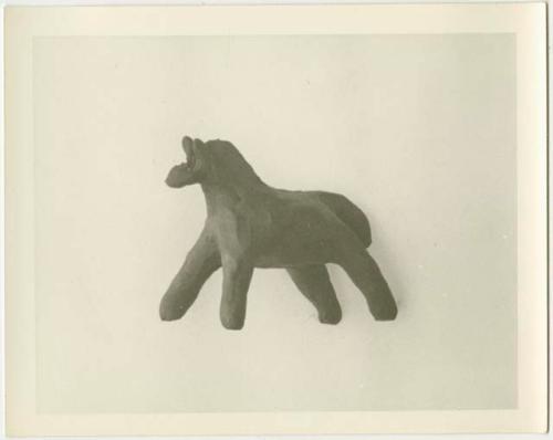 Plasticine model (print is enlarged and cropped)