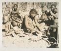 The group at Chukudu; woman scraping juicy root
