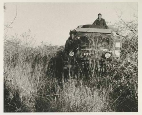 Expedition truck in brush, front view