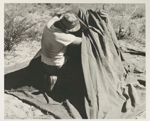 Casper Kruger putting up a tent
