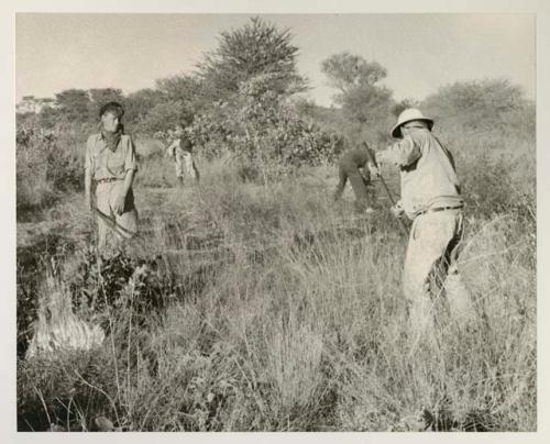 John Marshall and three other expedition members working on backfire