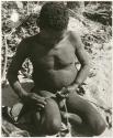 Oukwane rolling cord on his leg (print is a cropped image)