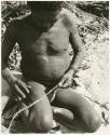 Oukwane rolling cord on his leg (print is a cropped image)