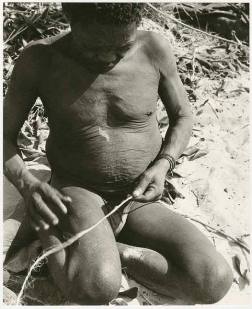 Oukwane rolling cord on his leg (print is a cropped image)