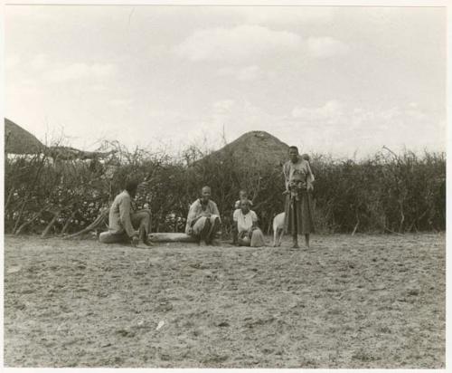 Group of six people at Lutlhe (print is a cropped image)