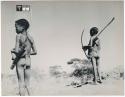 [No folder title]: Two boys carrying bows and quivers (print is a cropped image)