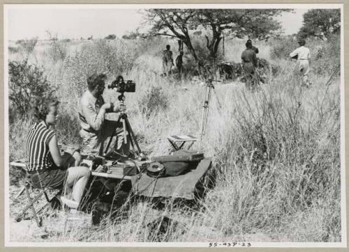 Group of people being interviewed by Lorna Marshall, with Kernel Ledimo and Dabe interpreting