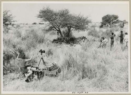 Group of people being interviewed by Lorna Marshall, with Kernel Ledimo and Dabe interpreting