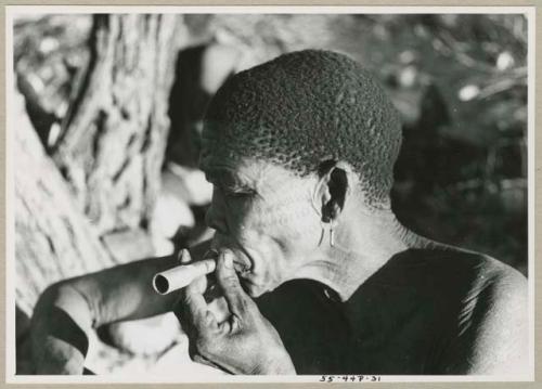 /Twikwe smoking a pipe