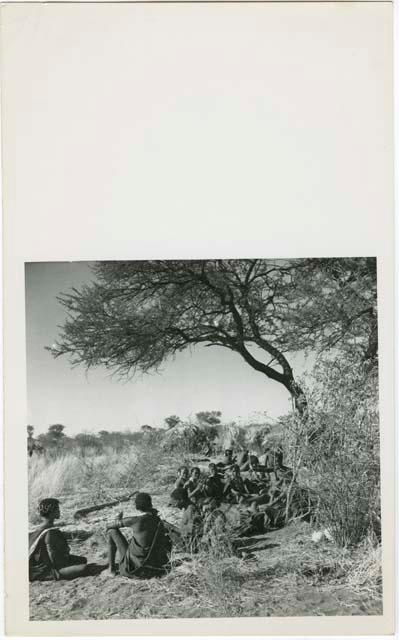 [No folder title]: "Gao Helmet" sitting with his extended family and relatives