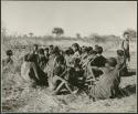 "Groups: women & children": Large group of women and children sitting (print is a cropped image)