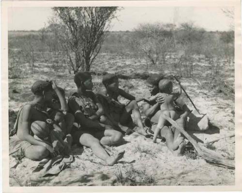 "Groups: women & children": Group of women sitting (print is a cropped image)