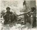 "Gao Medicine & family, 1955": /Naoka holding Debe in her arms and sitting beside Di!ai (print is a cropped image)