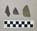 Chipped stone projectile points, broken