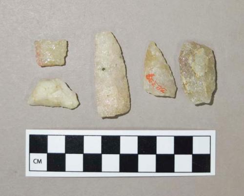 Chipped stone, quartz projectile points, broken