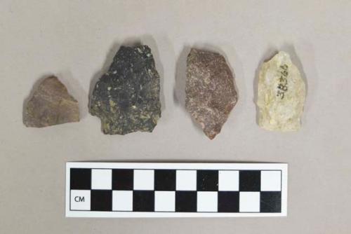 Chipped stone, including biface fragments some with stemmed bases