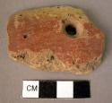 Pottery bowl rim sherd, perforated, red slipped and polished