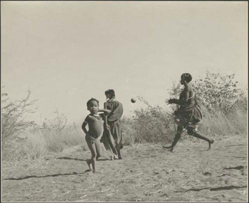 Three boys, including /Gaishay ("Gao Medicine's" son) and "Little ≠Gao" ("/Qui Navel's" son), playing or dancing (print is a cropped image). tamah n!o’an (ball game)
