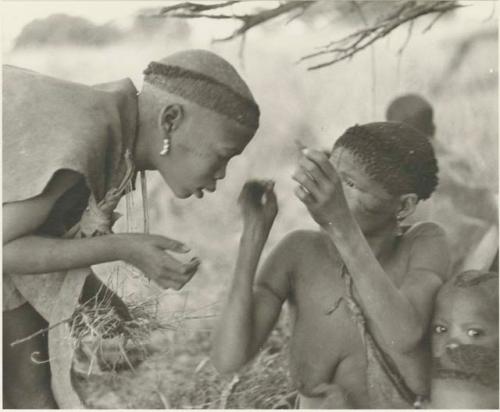 Two young women conversing