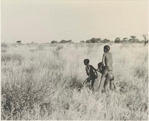 Three boys playing a horse game

