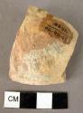 Potsherd - "Urfrinis" reddish brown wash used as paint, "partially coated"