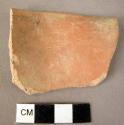 Rim fragment of pottery - red to orange-buff, low burnished
