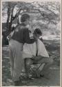 Lorna Marshall giving Casper Kruger a haircut